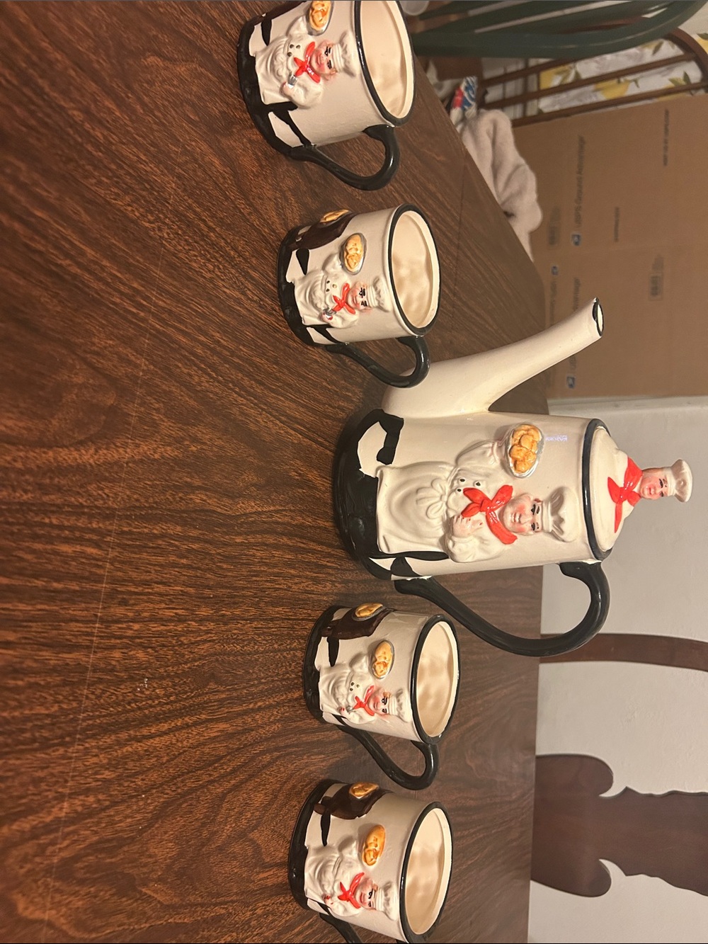 Rare Vintage chef teapot with four matching mugs.